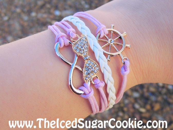 Pink and White Leather Bracelet by The Iced Sugar Cookie www.TheIcedSugarCookie.com - Infinity sign with rhinestone bow and ship steering wheel nautical girls women bracelets